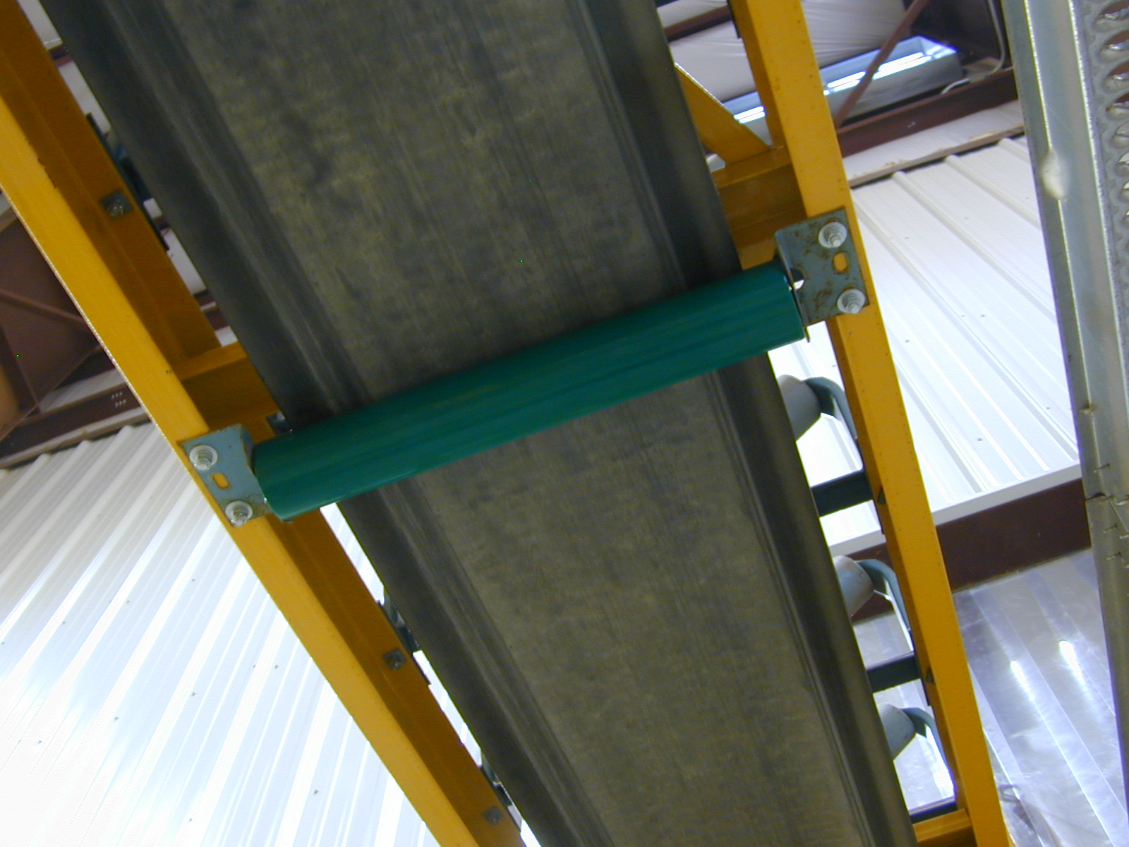 Conveyor equipment protected with polyurea corrosion coating