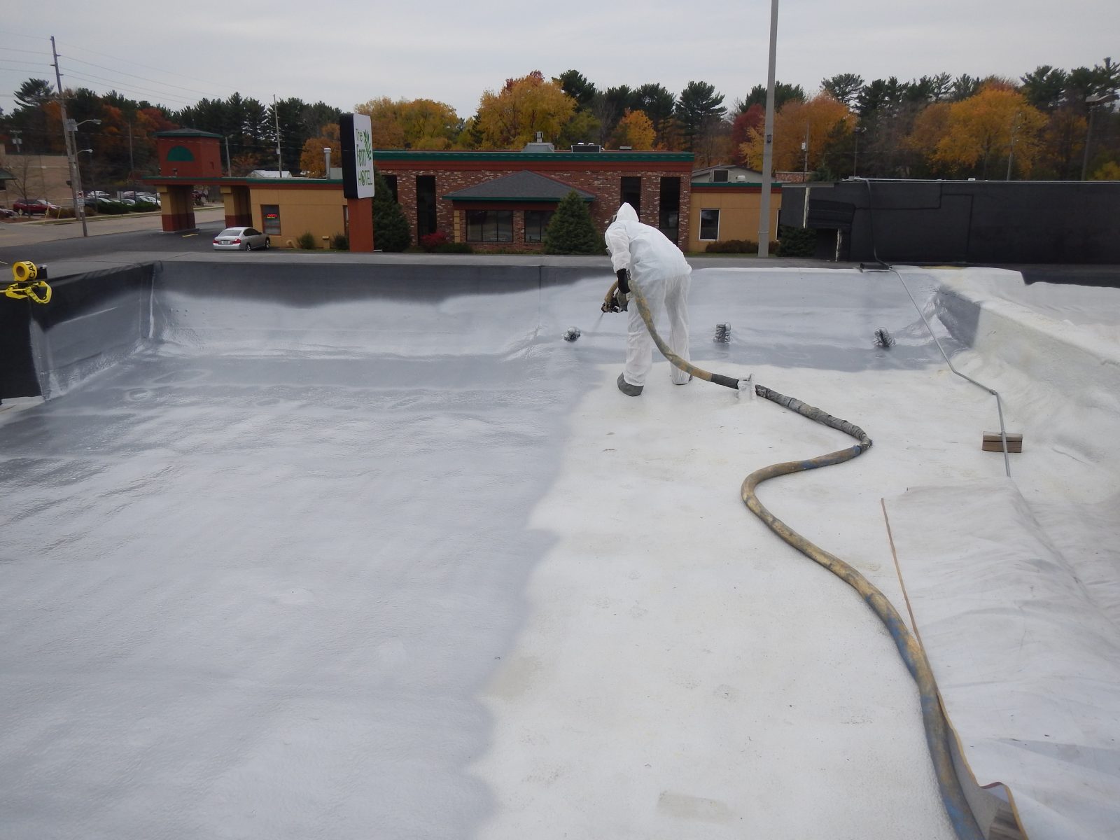 Seamless polyurea roof membrane on a commercial metal roof